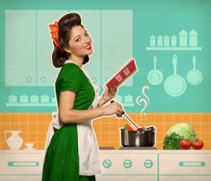 Retro smiling woman cooking and reading recipe book in her kitch